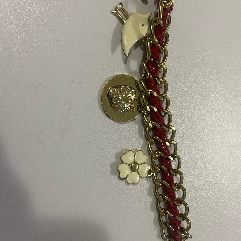 Juicy Couture Gold and Red Bracelet with Charms
